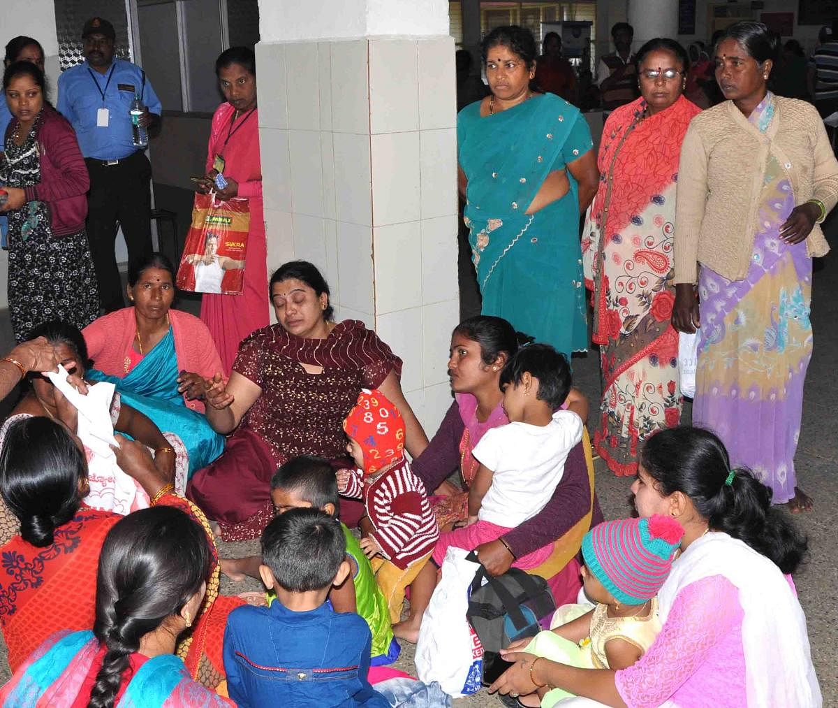 Relatives of the two women at the district hospital, Hassan.