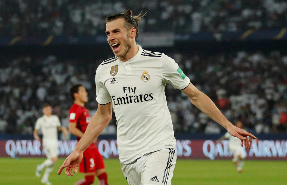 FANTASTIC FORM: Real Madrid's Gareth Bale celebrates scoring their second goal against Kashima Antlers. REUTERS