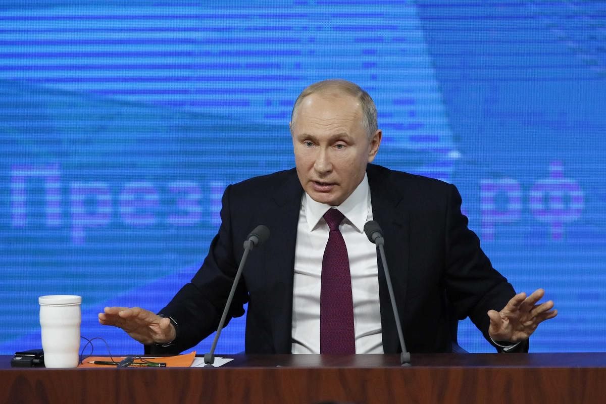Russian President Vladimir Putin speaks during the annual news conference in Moscow, Russia. (Reuters Photo)
