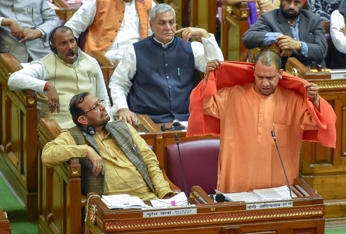Uttar Pradesh Chief Minister Yogi Adityanath addresses the Assembly on supplementary budget during the Winter Session, in Lucknow, Thursday, Dec. 20, 2018. (PTI Photo)