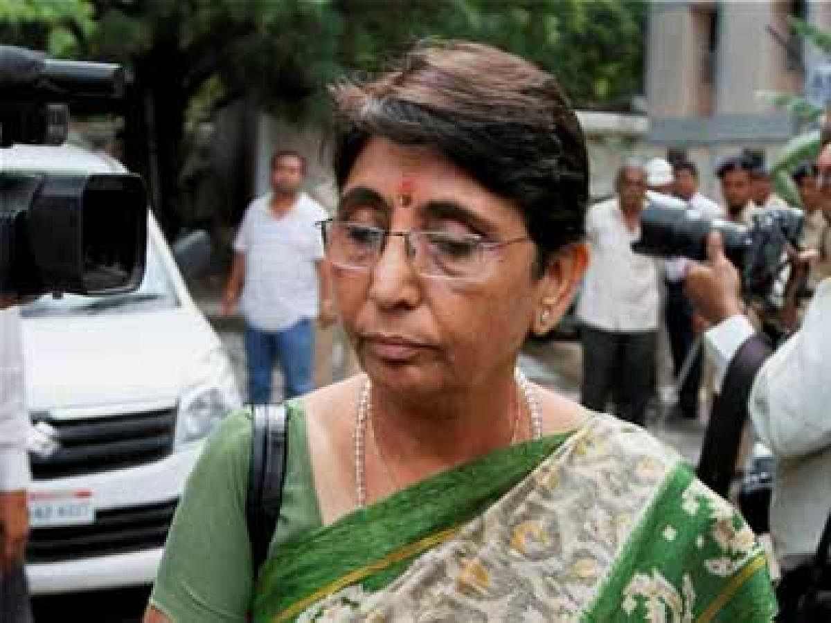 Kodnani was seen sharing the dais with Union Textiles Minister Smriti Irani and other women leaders of the ruling party on the second day of the two-day BJP women wing's national convention at Trimandir at Adalaj in Gandhinagar. (PTI File Photo)