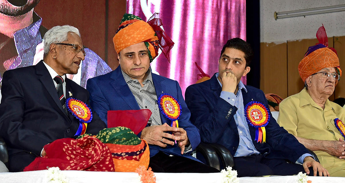 (Left to right) S N Srinivasamurthy of Dhondusa Group and Srinivas H Khoday, president of Akhila Bharatiya Somavamshiya Sahasrarjuna Kshatriya Samaja, chat during the Rajarajeshwara Sahasrarjuna Maharaja Jayanthi celebrations in the city on Sunday. Brijmo