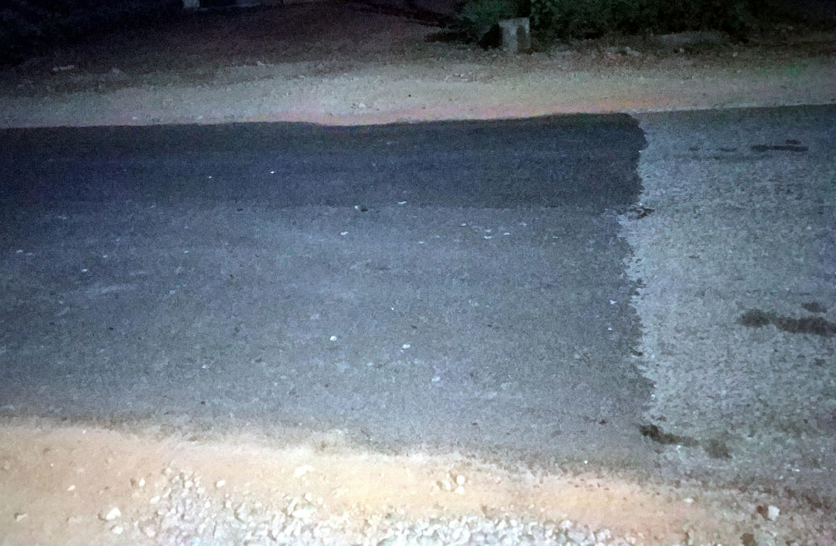 The pothole-ridden road leading to Inspection Bungalow in Udupi being repaired ahead of the President’s visit.