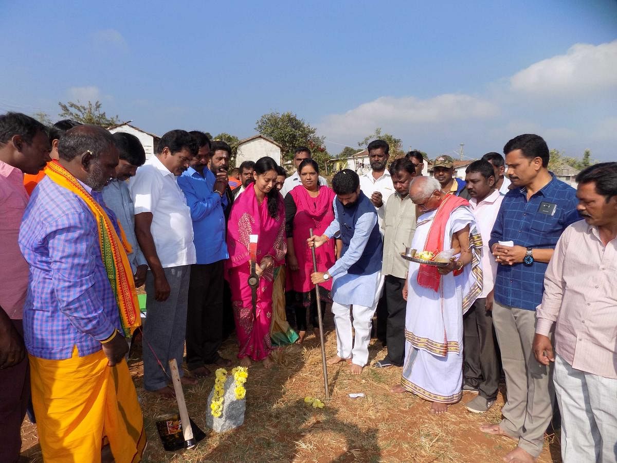 MLA C T Ravi takes part in the groundbreaking ceremony of the construction of houses for civic workers.