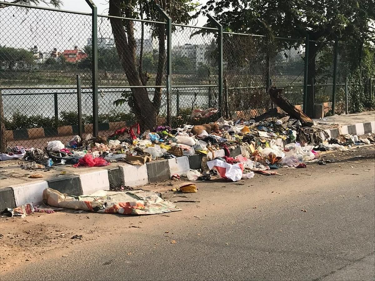 Garbage dumped on the road across the Sheelavanthakere Lake near Whitefield. Facebook