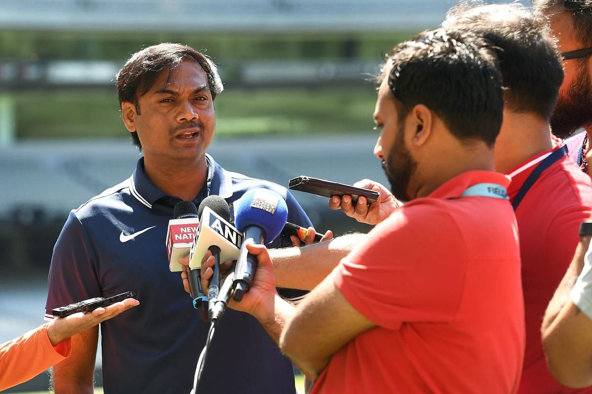 ndia's chairman of the selectors MSK Prasad (left) speaks to the media after a training session in Melbourne on Sunday. AFP 