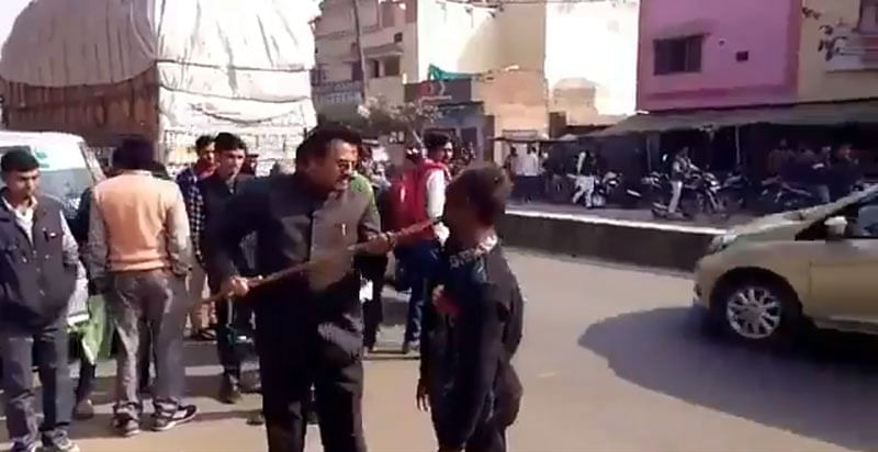 In the video, the local BJP leader, Mohammad Miya, purportedly assaults the man who was shouting that he would vote for Samajwadi Party chief Akhilesh Yadav. (Screengrab)