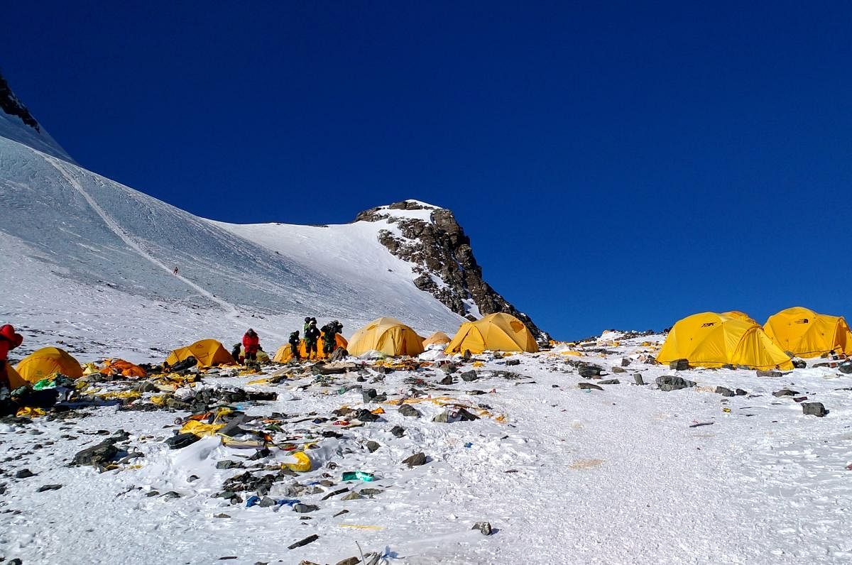 Discarded climbing equipment and rubbish scattered around Camp 4 of Mount Everest. AFP
