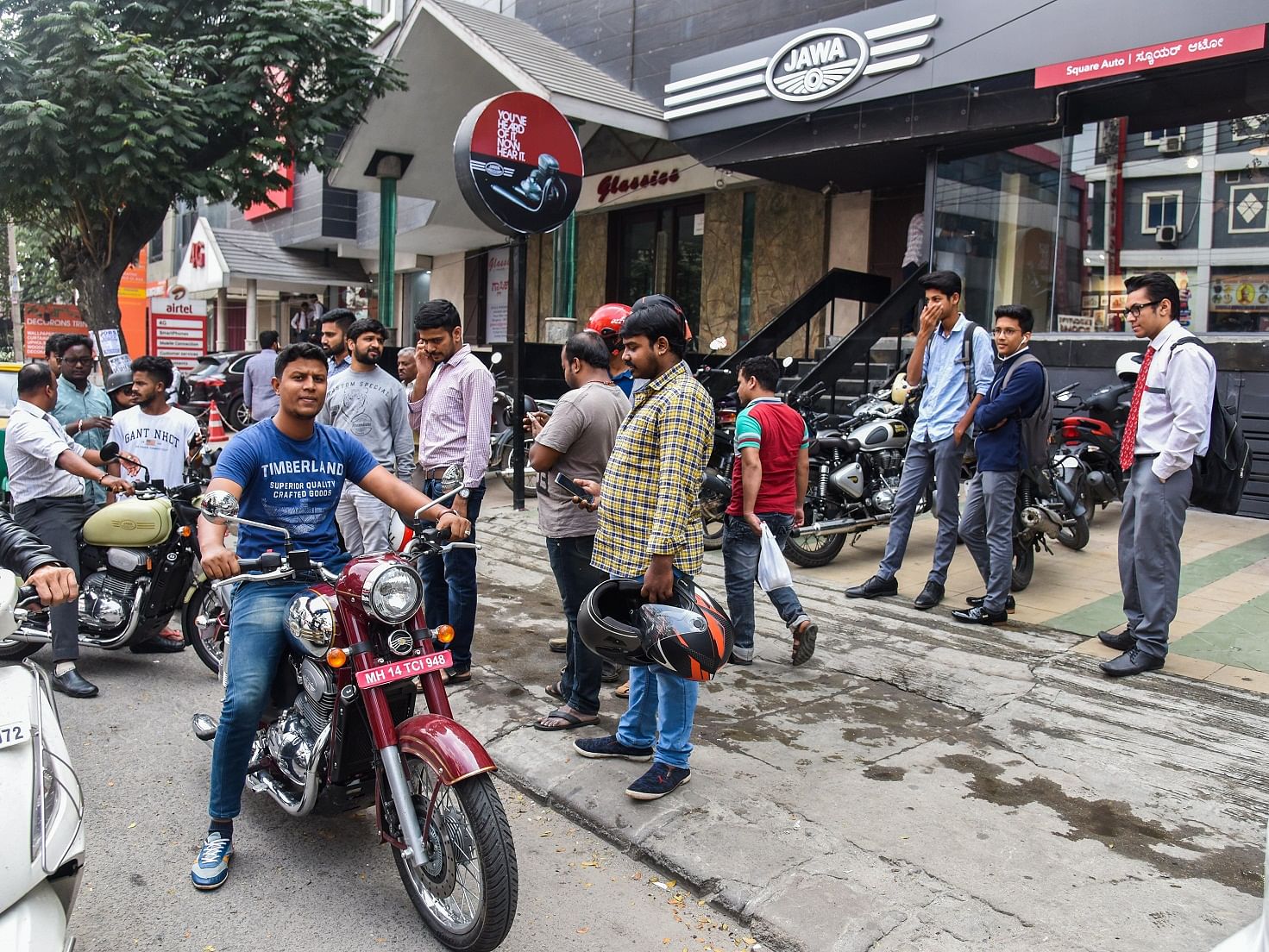 Bike enthusiasts test ride the new Jawa at the Koramangala outlet. DH PHOTO BY S K DINESH
