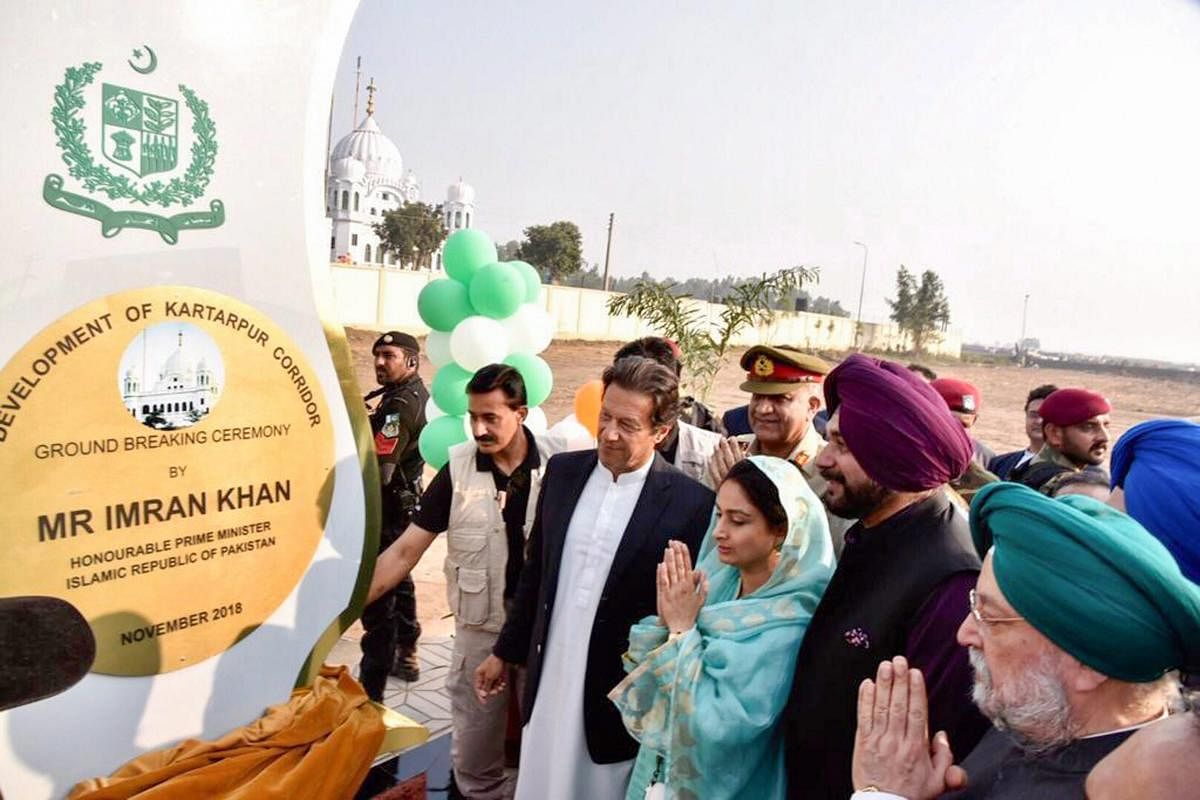 Pakistan's Prime Minister Imran Khan, cricketer-turned-politician Navjot Singh Sidhu, Minister for Food Processing Industries Harsimrat Kaur Badal during the groundbreaking ceremony for Kartarpur corridor in Pakistan's Kartarpur. (PTI Photo)