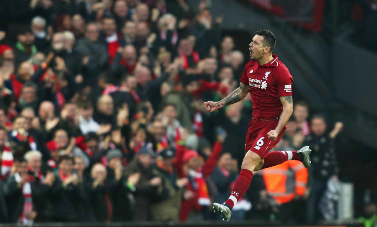 Liverpool's Dejan Lovren celebrates scoring their first goal against Newcastle United at Anfield. (Reuters)