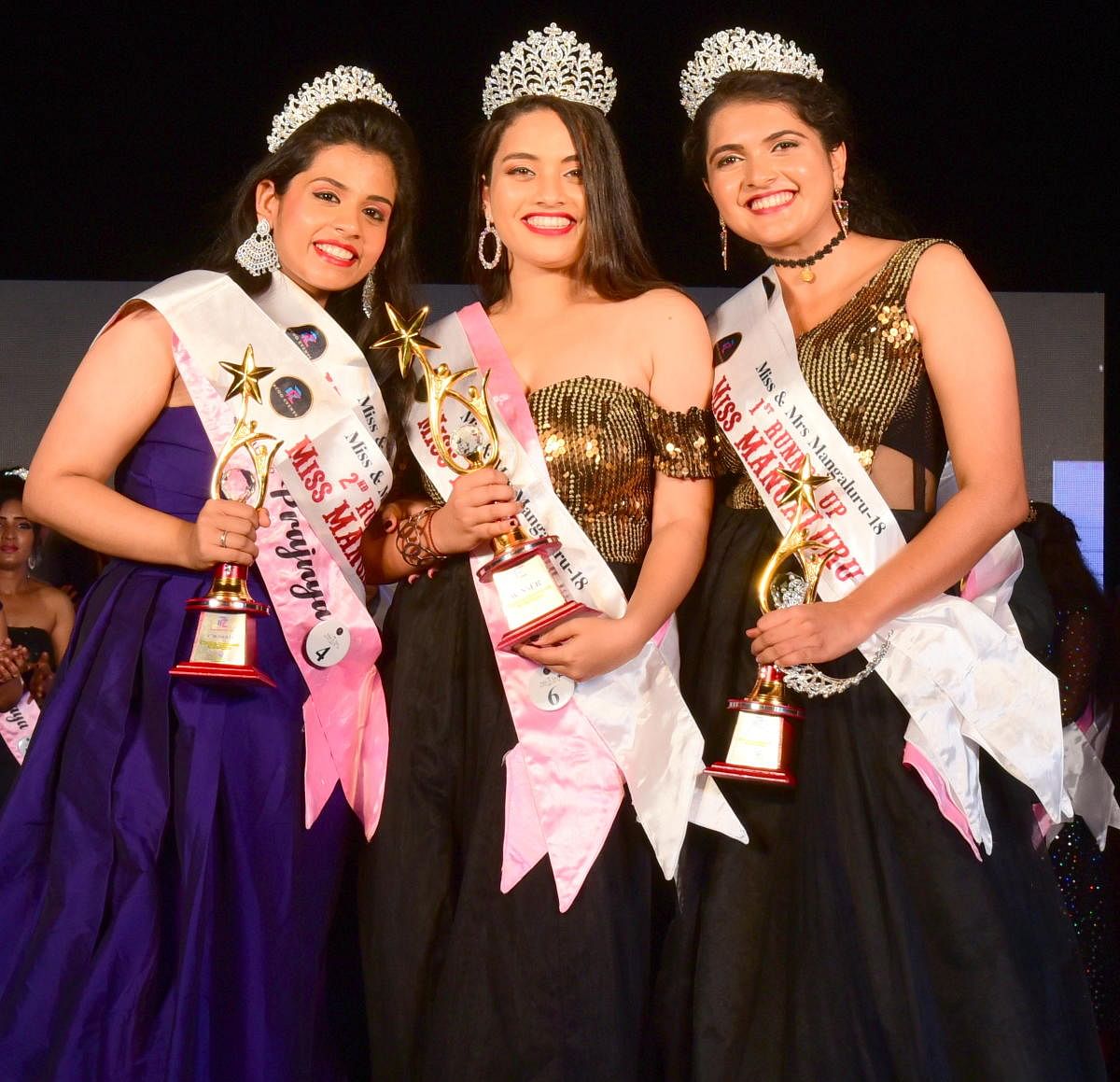 Amanda Lasrado (centre), who was crowned Envigreen Miss Mangaluru 2018, poses with Nishitha Fernandes (right), the first runner-up and Prajnya, the second runner-up in Mangaluru recently.