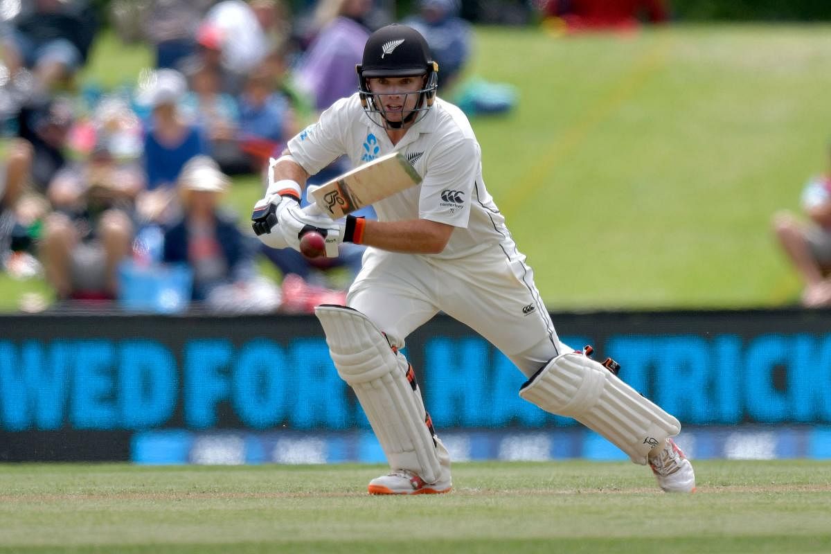 PROLIFIC: New Zealand's batsman Tom Latham drives en route his 176 against Sri Lanka on the third day of the second Test at Christchurch. AFP