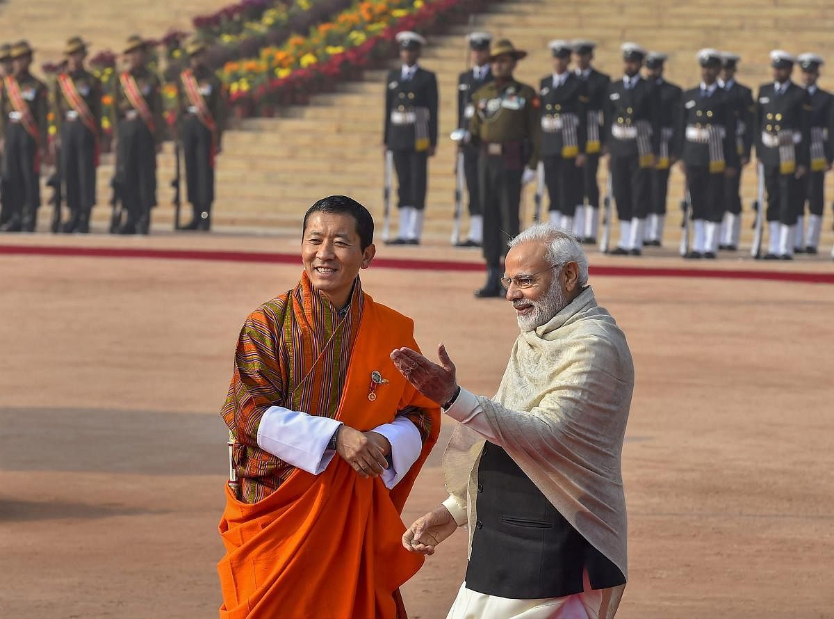 Prime Minister Narendra Modi with Bhutanese Prime Minister Lotay Tshering during his ceremonial reception at Rashtrapati Bhawan, in New Delhi. (PTI Photo)