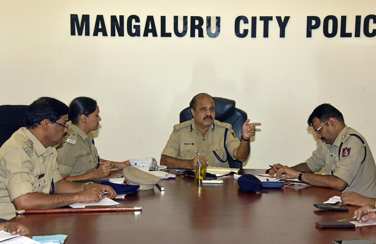 City Police Commissioner T R Suresh speaks during a phone-in programme held at the office of the Commissionerate of Police in Mangaluru.