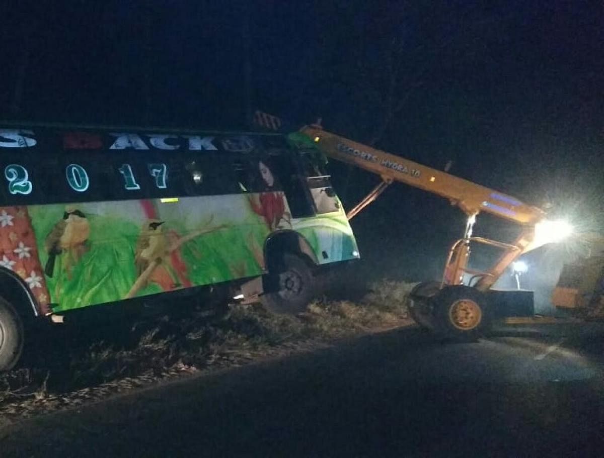 The private bus that met with an accident was lifted using a crane at Shanthigeri near Suntikoppa in Kodagu district.