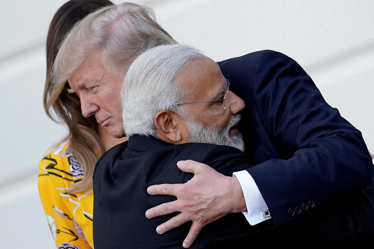FILE PHOTO: India's Prime Minister Narendra Modi hugs U.S. President Donald Trump as he departures the White House after a visit, in Washington, U.S., June 26, 2017. REUTERS/Carlos Barria/File photo