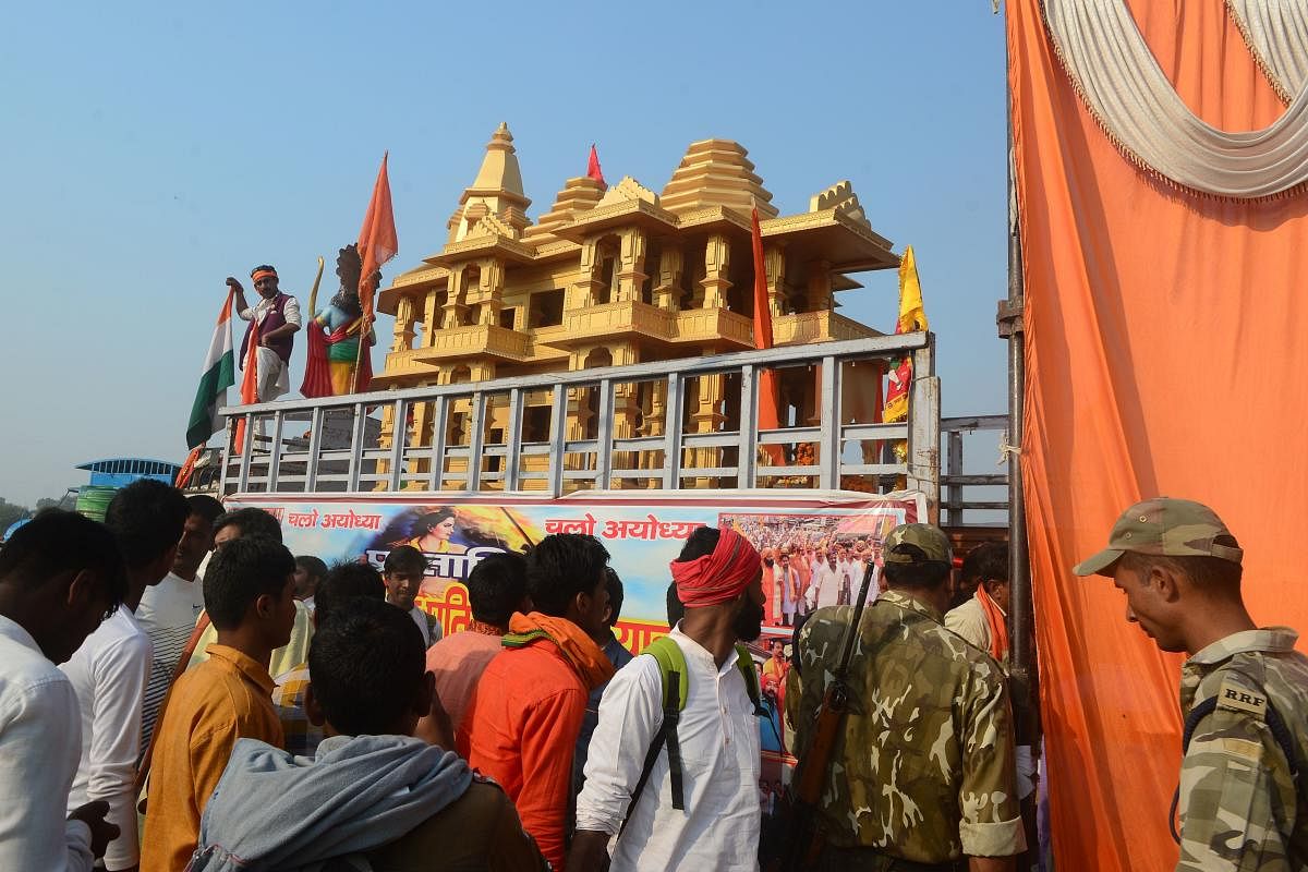 People watch a model of the Ram temple during the 'Dharam Sabha' held to call for the construction of a grand temple of Lord Rama, in Ayodhya on November 25, 2018. AFP file photo