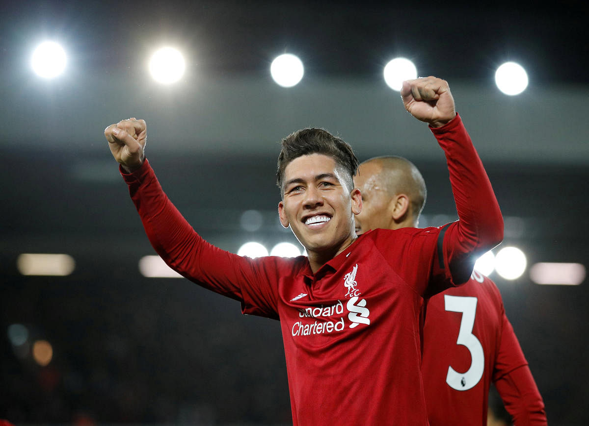 Soccer Football - Premier League - Liverpool v Arsenal - Anfield, Liverpool, Britain - December 29, 2018 Liverpool's Roberto Firmino celebrates scoring their fifth goal REUTERS/Phil Noble EDITORIAL USE ONLY. No use with unauthorized audio, video, data, fi