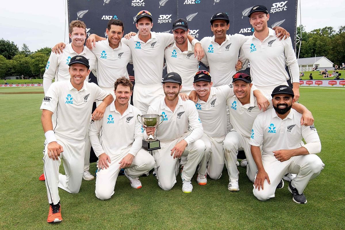 New Zealand players are all smiles after defeating Sri Lanka in the second Test on Sunday to claim the series 1-0. AFP