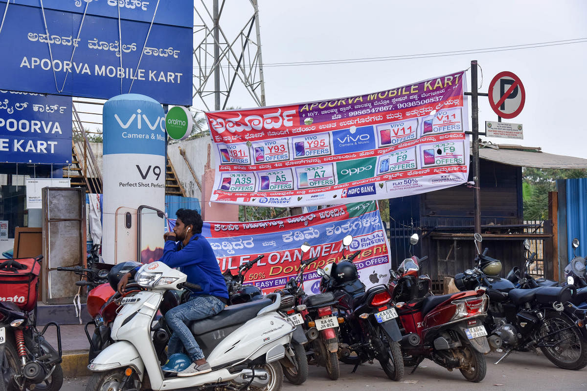 Flex banners put up at T Dasarahalli. DH PHOTO/B H SHIVAKUMAR