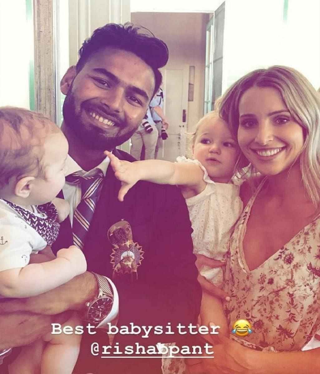 Australia captain Tim Paine's wife Bonnie Paine (left) posted this picture in her Instagram, calling Rishab Pant 'best babysitter.'