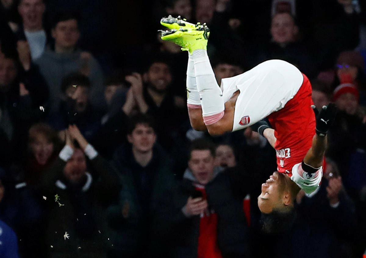 LEAP OF JOY: Arsenal's Pierre-Emerick Aubameyang celebrates after scoring against Fulham on Tuesday. REUTERS
