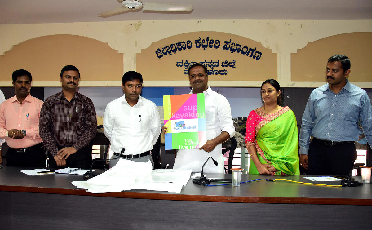 District In-charge Minister U T Khader unveils the logo of the river fest at the deputy commissioner’s office in Mangaluru on Tuesday.