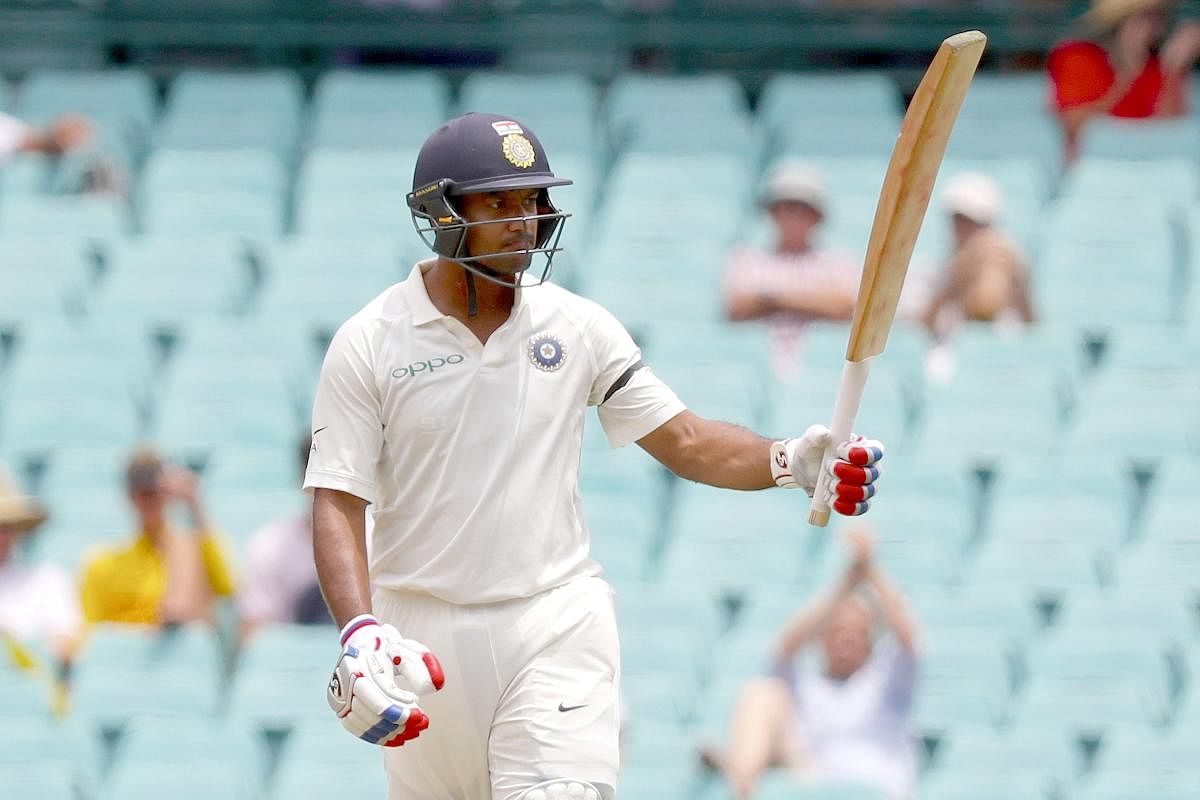 India's Mayank Agarwal celebrates reaching fifty runs against Australia during the first day of the fourth and final cricket Test at the Sydney Cricket Ground in Sydney . AFP photo