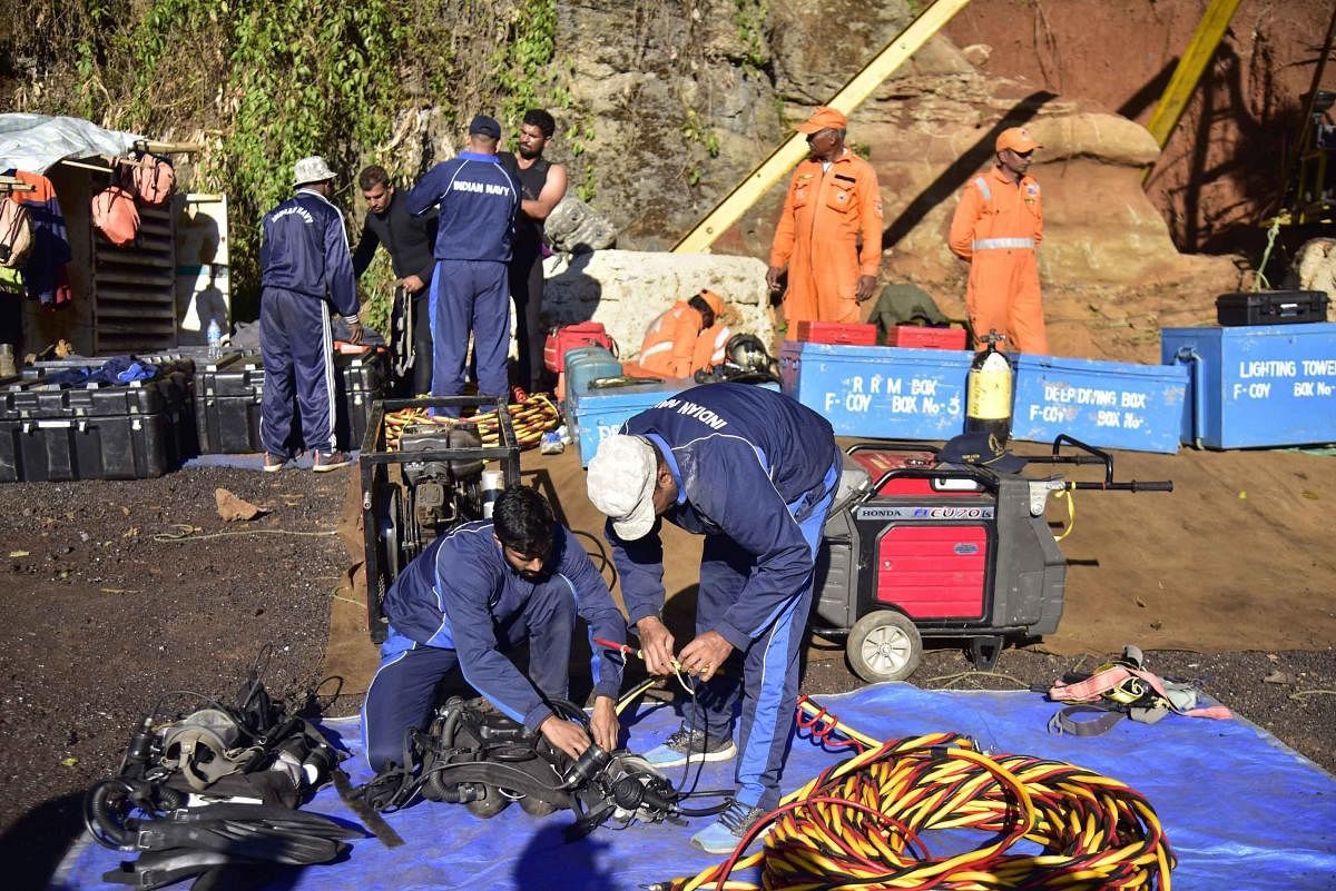 Jaintia Hills: Navy and NDRF personnel conduct rescue task at the site of a coal mine collapse at Ksan, in Jaintia Hills district of Meghalaya, Sunday, Dec. 30, 2018. (PTI Photo) (PTI12_30_2018_000162A)
