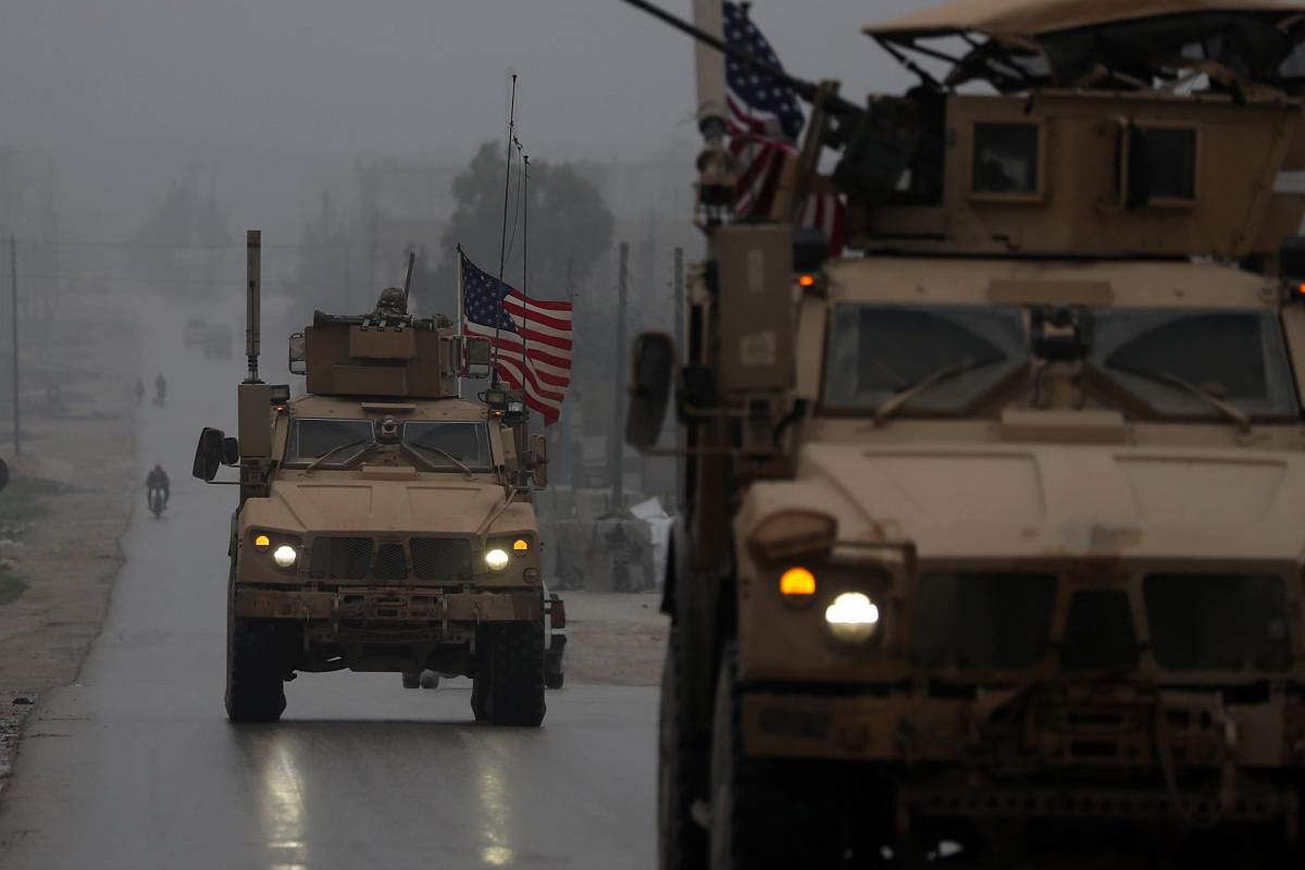 A line of US military vehicles in Syria's northern city of Manbij. (AFP File Photo)