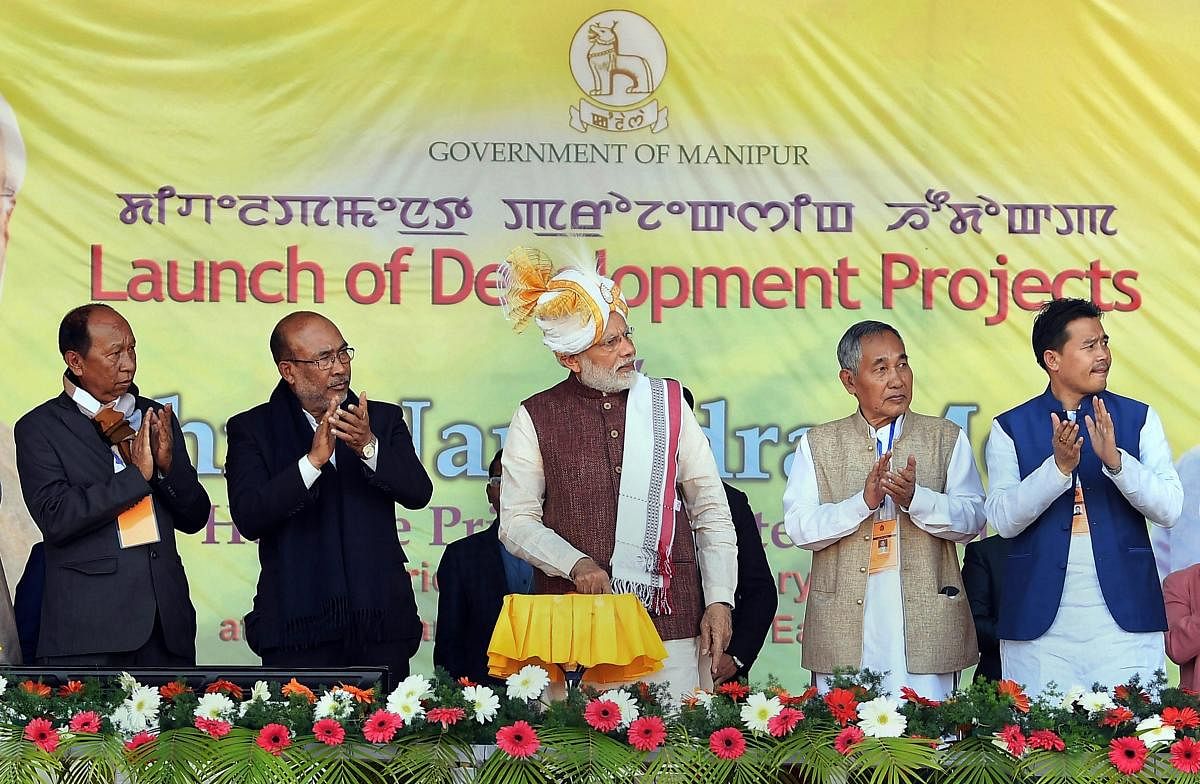 Prime Minister Narendra Modi launches developemnt projects, in Imphal, Friday, Jan 4, 2019. Manipur Chief Minister N Biren Singh is also seen. (PIB Photo via PTI)