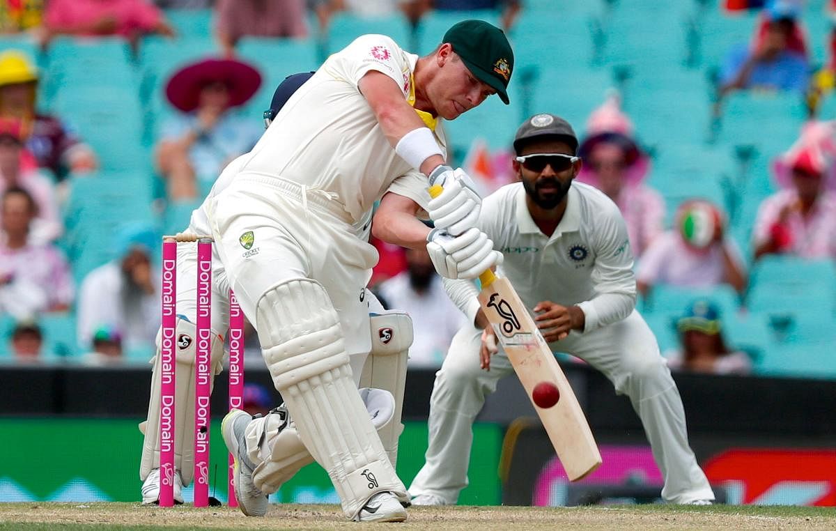 Australia's Marcus Harris hits a boundary during the third day's play of the fourth and final cricket Test between India and Australia at the Sydney Cricket Ground on January 5, 2019. (AFP Photo)