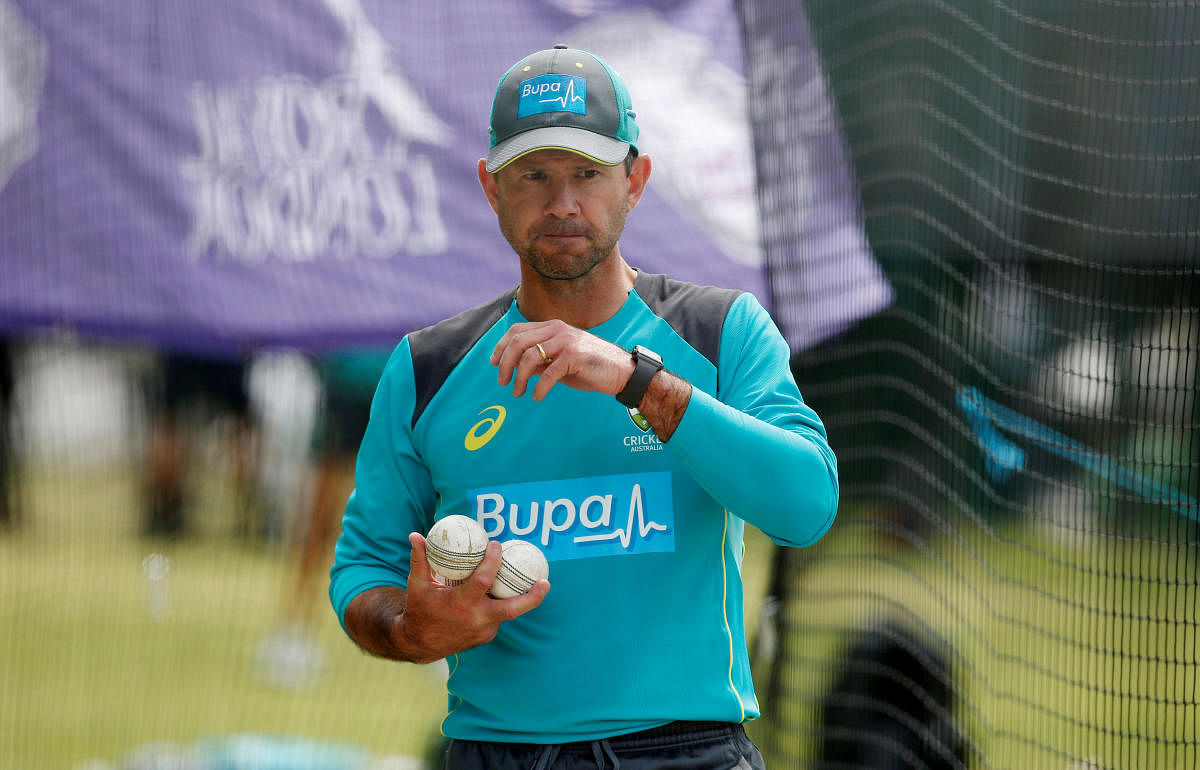 Former Australia captain Ricky Ponting on Sunday slammed the current team for showing "no desperation" after Nathan Lyon decided against reviewing his lbw decision on day four of the fourth Test against India here. Reuters file photo