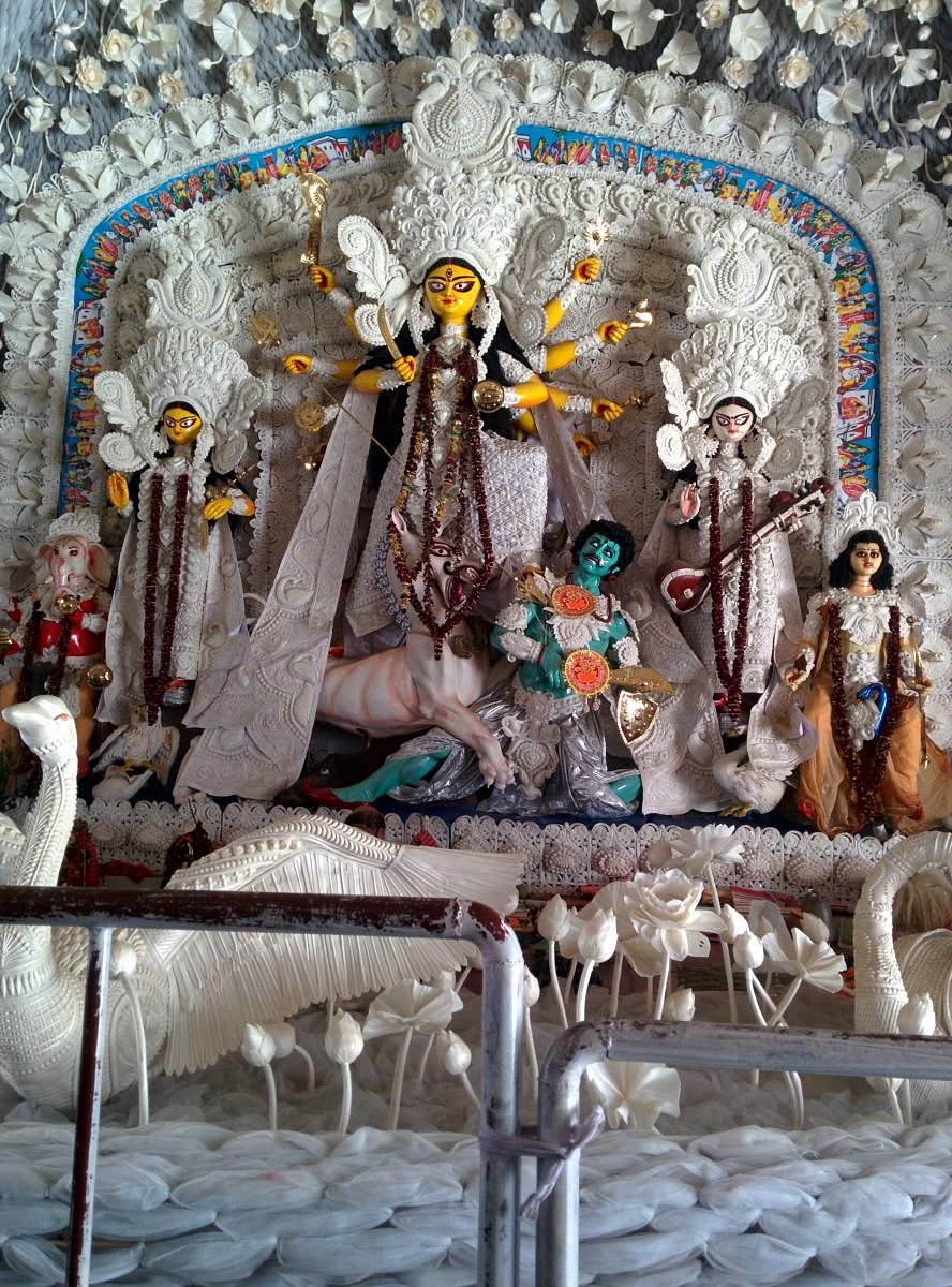 Sholapith work on Durga idol decor. Photo by author 
