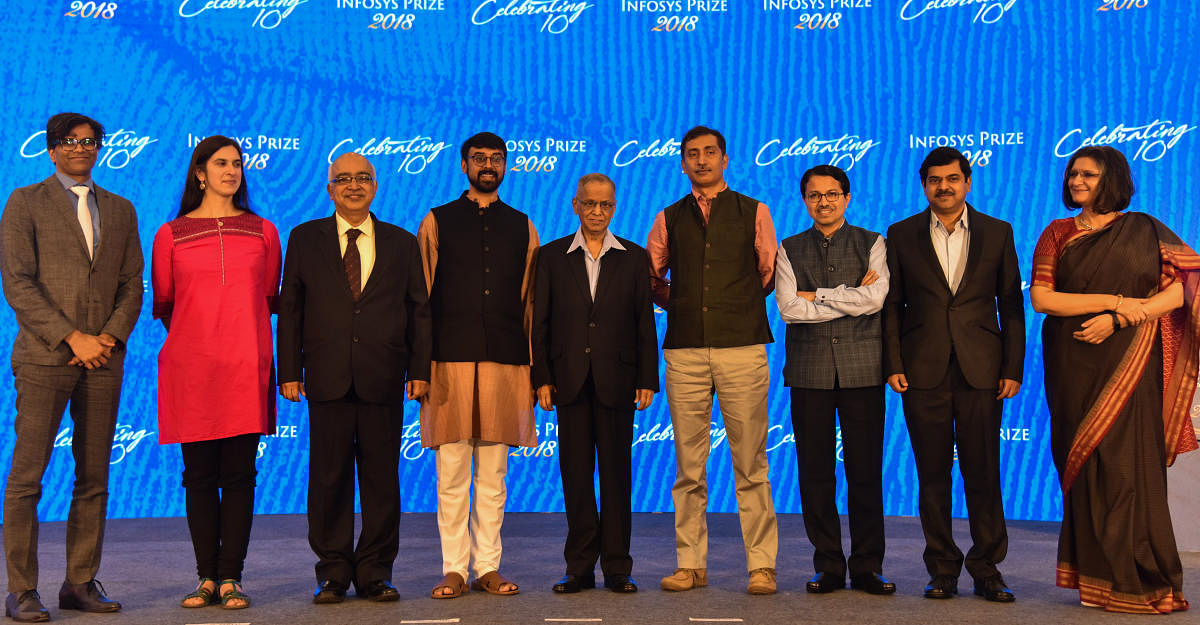Infosys Science Foundation awardees with K Dinesh, Co Founder, Infosys Limited, Prof Manjul Bhargava R, Brandon Fradd Professor of Mathematics and Narayana Murthy, Founder, Infosys Limited at a award presentation programme in Bengaluru on Saturday. (DH Photo/S K Dinesh)