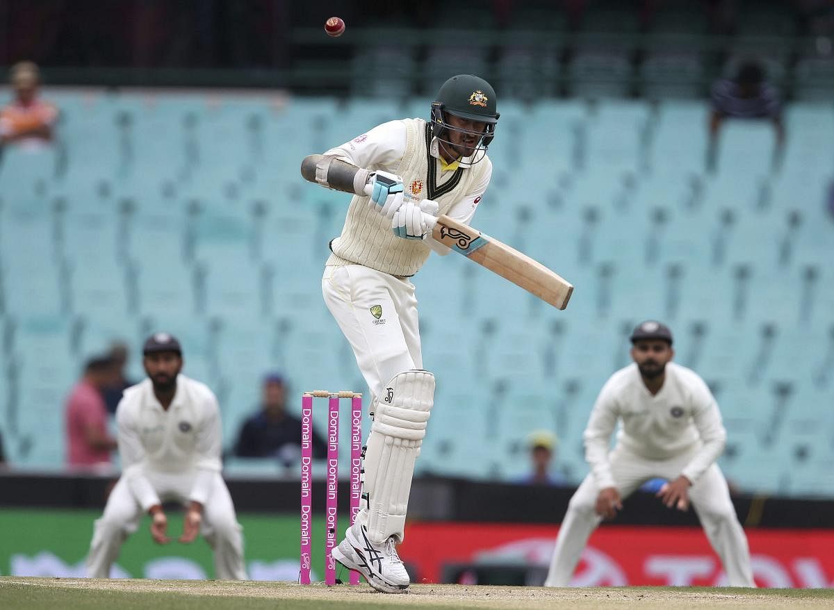 Australia's Mitchell Starc lets a high ball go past on day 4 of their cricket test match against India in Sydney, Sunday, Jan. 6, 2019. AP/PTI