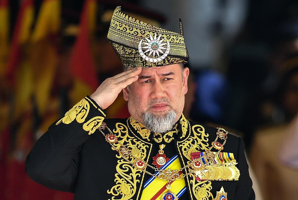 15th king of Malaysia, Sultan Muhammad V, saluting a royal guard of honour during the opening ceremony of the parliament in Kuala Lumpur. AFP file photo