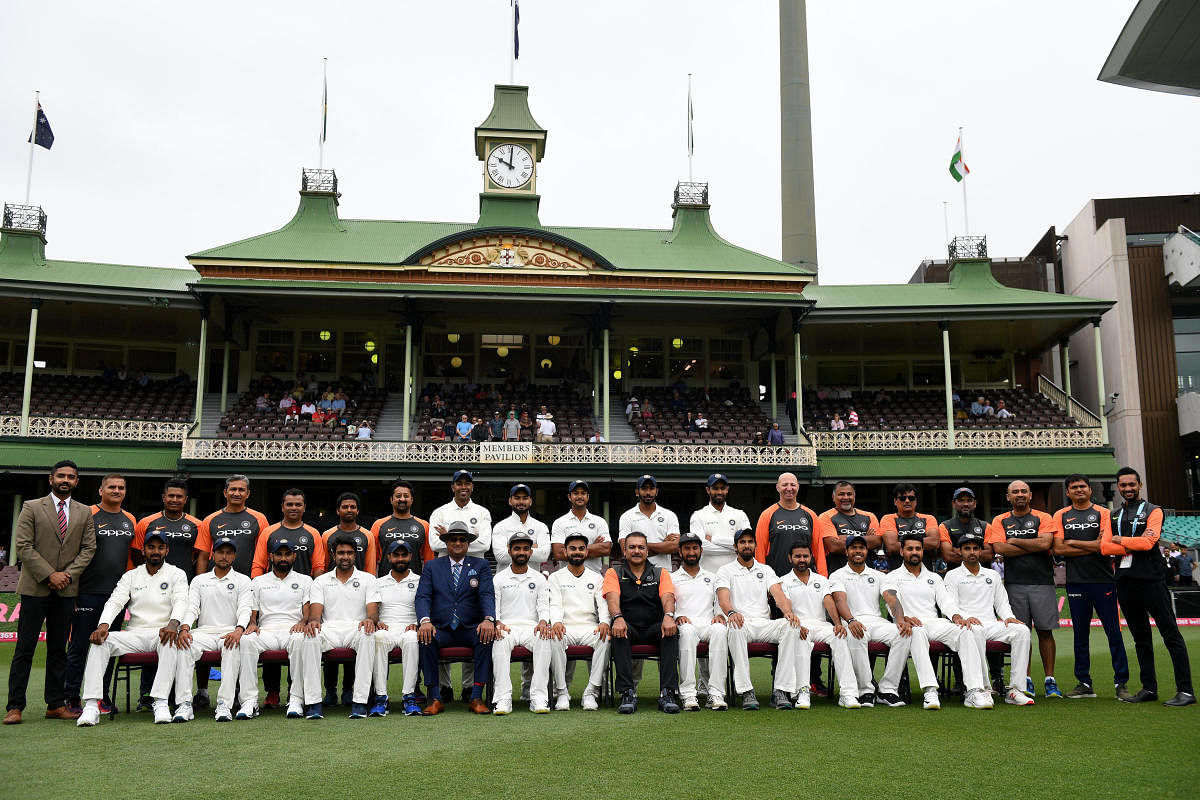 The Indian cricket team and staff pose for a photograph ahead of play on day five of the fourth test match between Australia and India at the SCG in Sydney, Australia, January 7, 2019. REUTERS