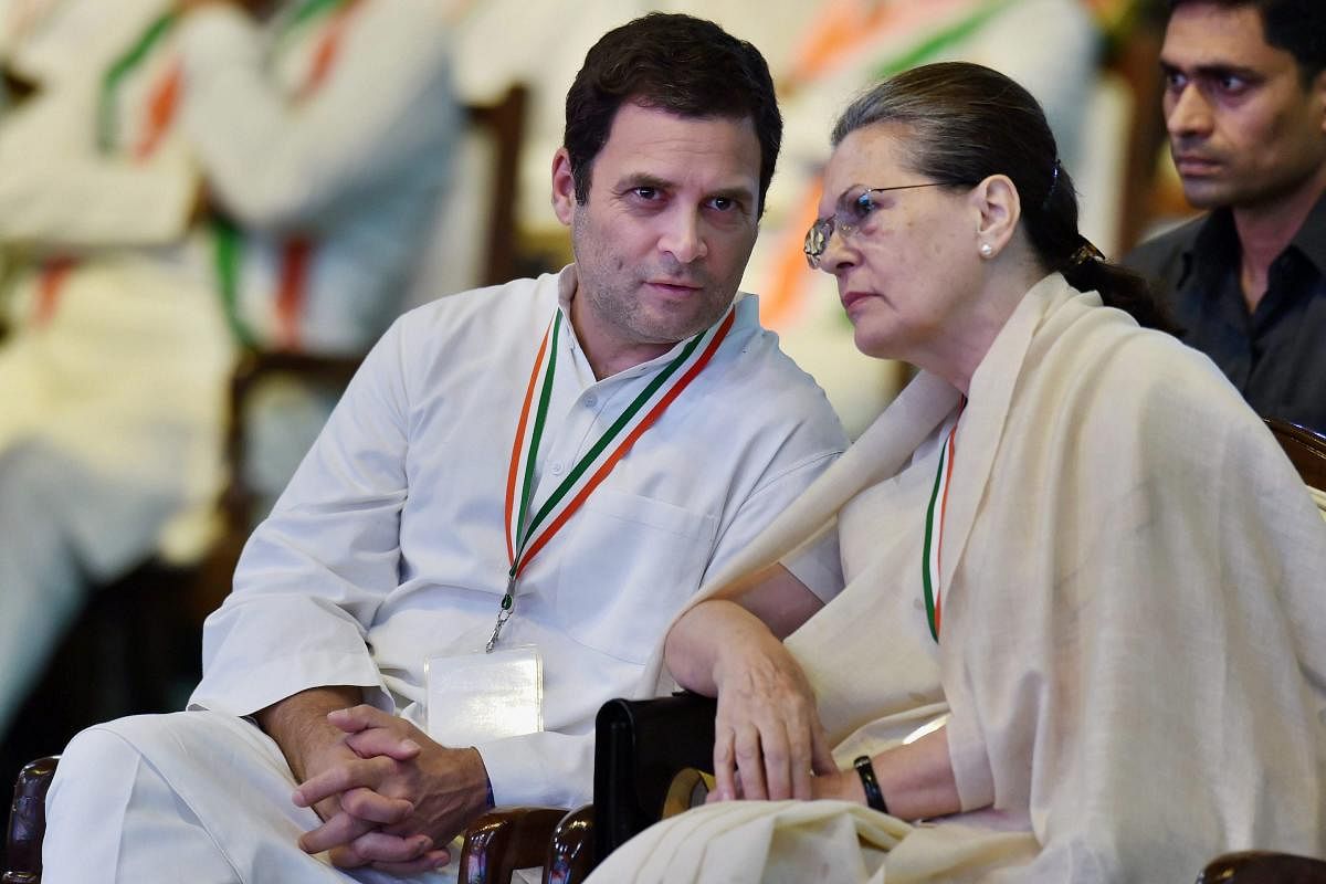 Sonia Gandhi and President Rahul Gandhi talk during the 84th Plenary Session of Indian National Congress. PTI file photo