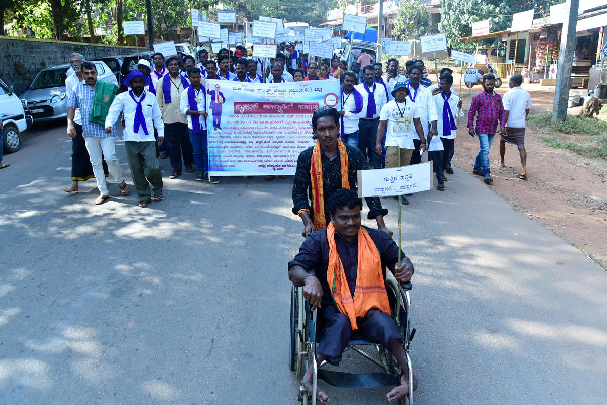 Zilla Dalit Seva Samithi members take out a rally from Vittal to Mangaluru on Monday.