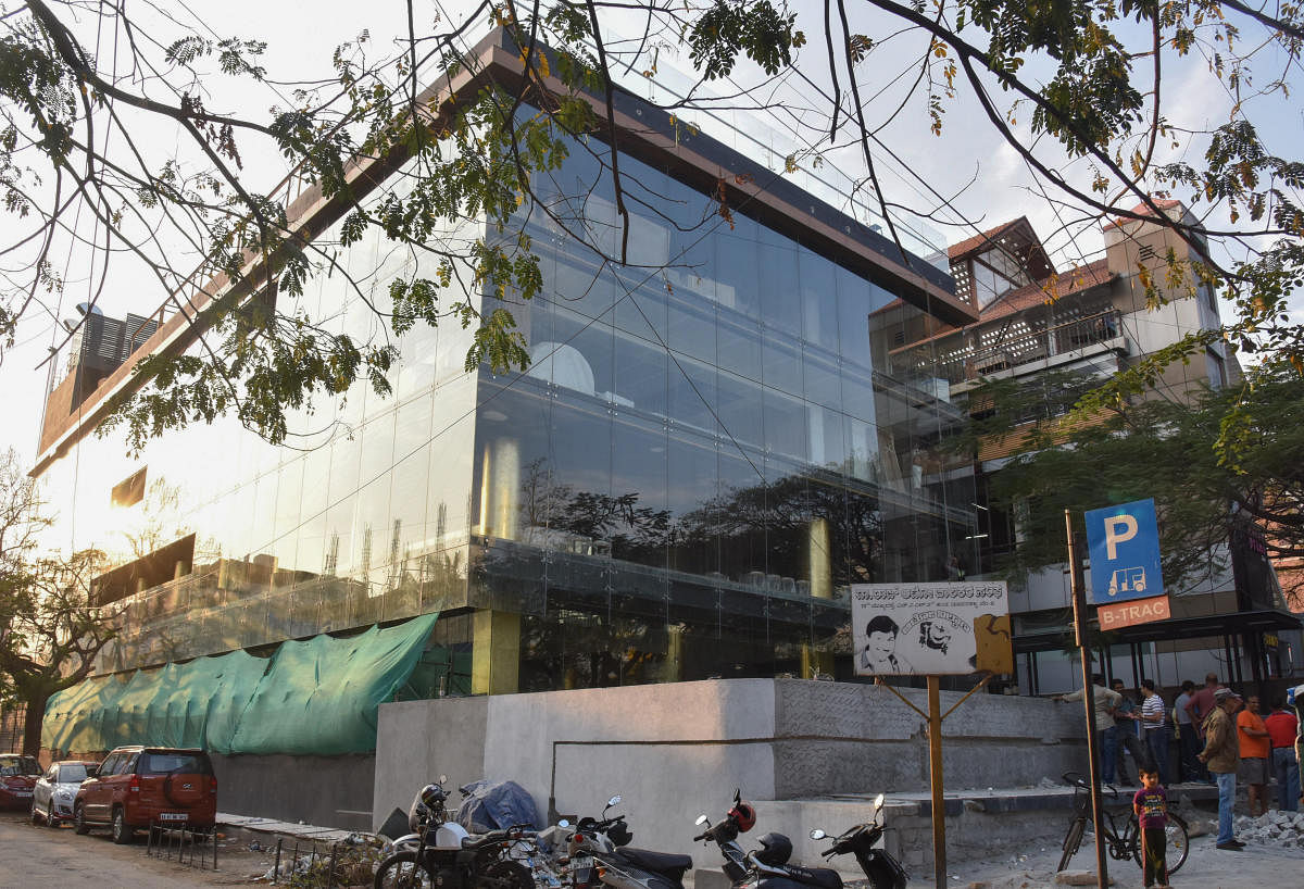 A building on Indiranagar 100 Feet Road that is accused of violating bylaws. Similar violations have been witnessed in other residential areas in the city. DH FILE PHOTO