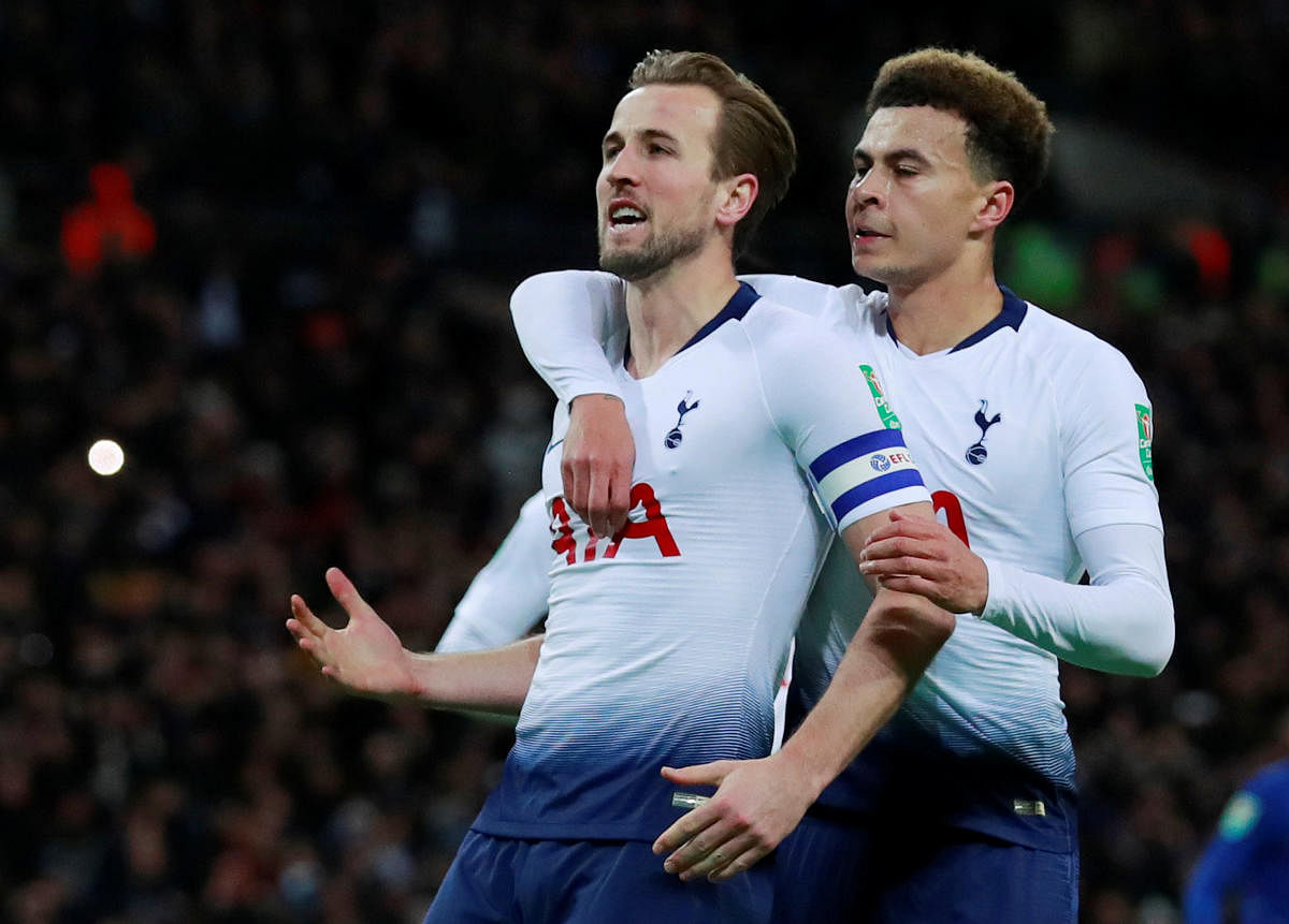 Tottenham Hotspur's Harry Kane (left) celebrates with team-mate Dele Alli after scoring against Chelsea on Tuesday night. Reuters