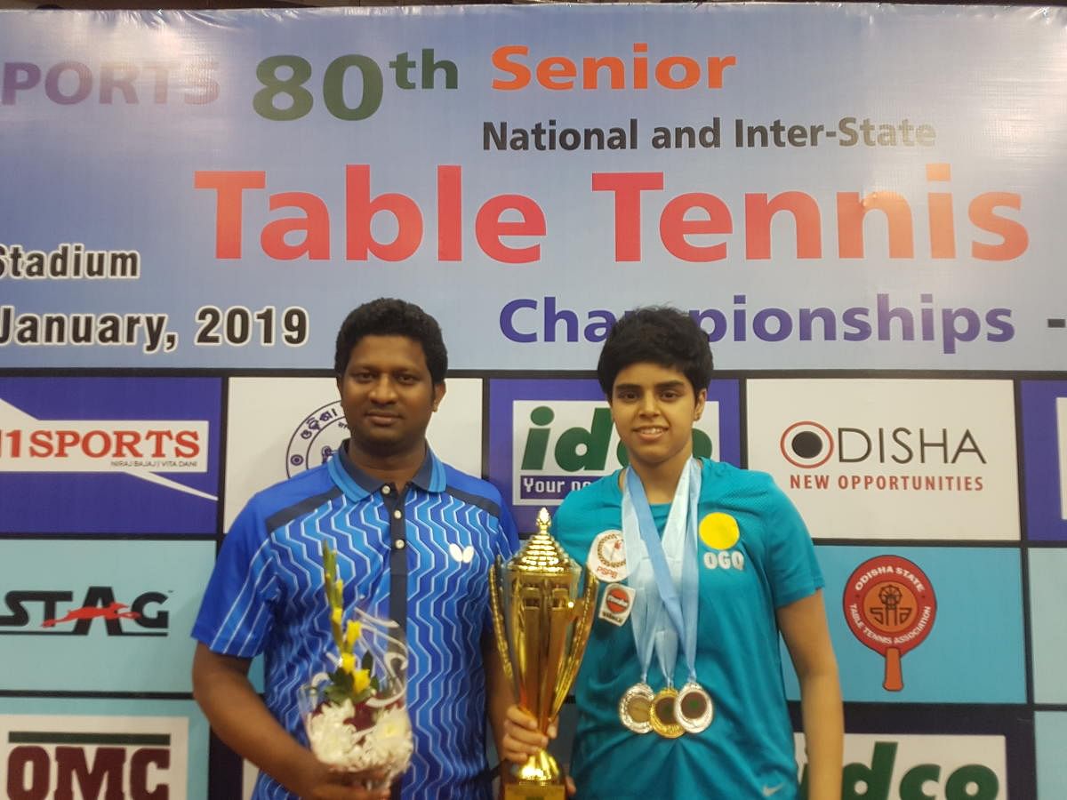 BRILLIANT: Archana Kamath with the trophy after winning the senior national title.