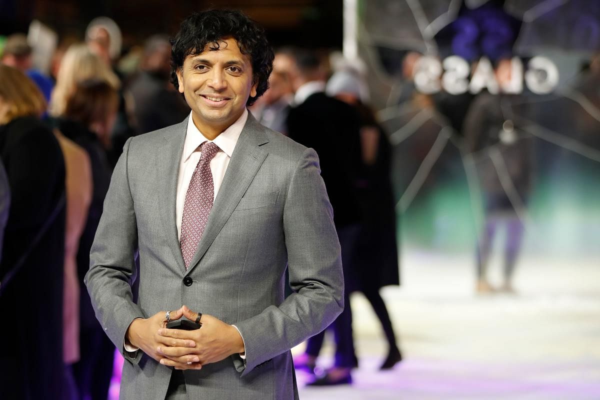 M. Night Shyamalan poses on arrival for the European premiere of Glass in central London. AFP.