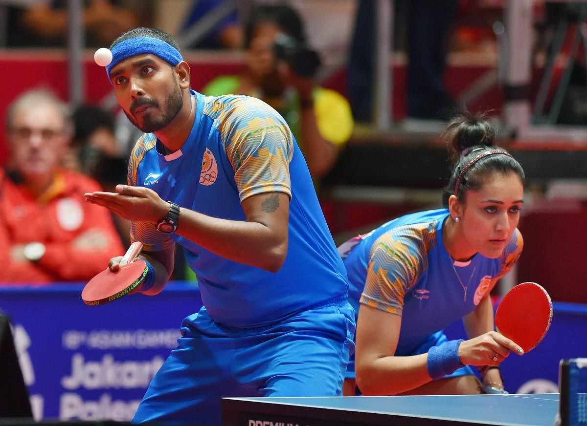 winsome twosome: Sharath Kamal says he is keen to seek success in mixed doubles, where he won bronze with Manika Batra at the Asian Games. 
