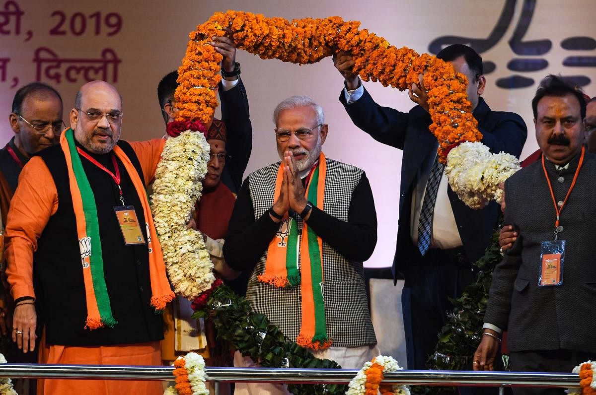 Addressing the BJP's National Convention at the Ramlila Maidan here, Modi said for the first time in the country's history, there has not been any charge of corruption against a government. (PTI Photo)