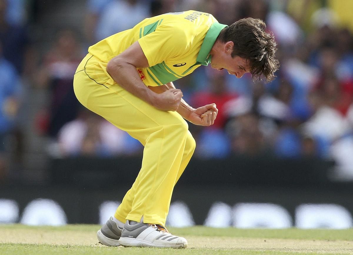 PUMPED UP: Australia's Jhye Richardson celebrates after taking the wicket of India's Ambati Rayudu. AP/PTI