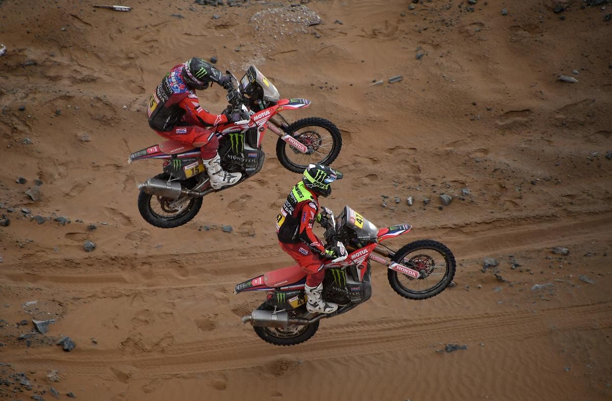 US biker Ricky Brabec and Argentina's Kevin Benavides power their Hondas during Stage 5 of the Dakar Rally. AFP