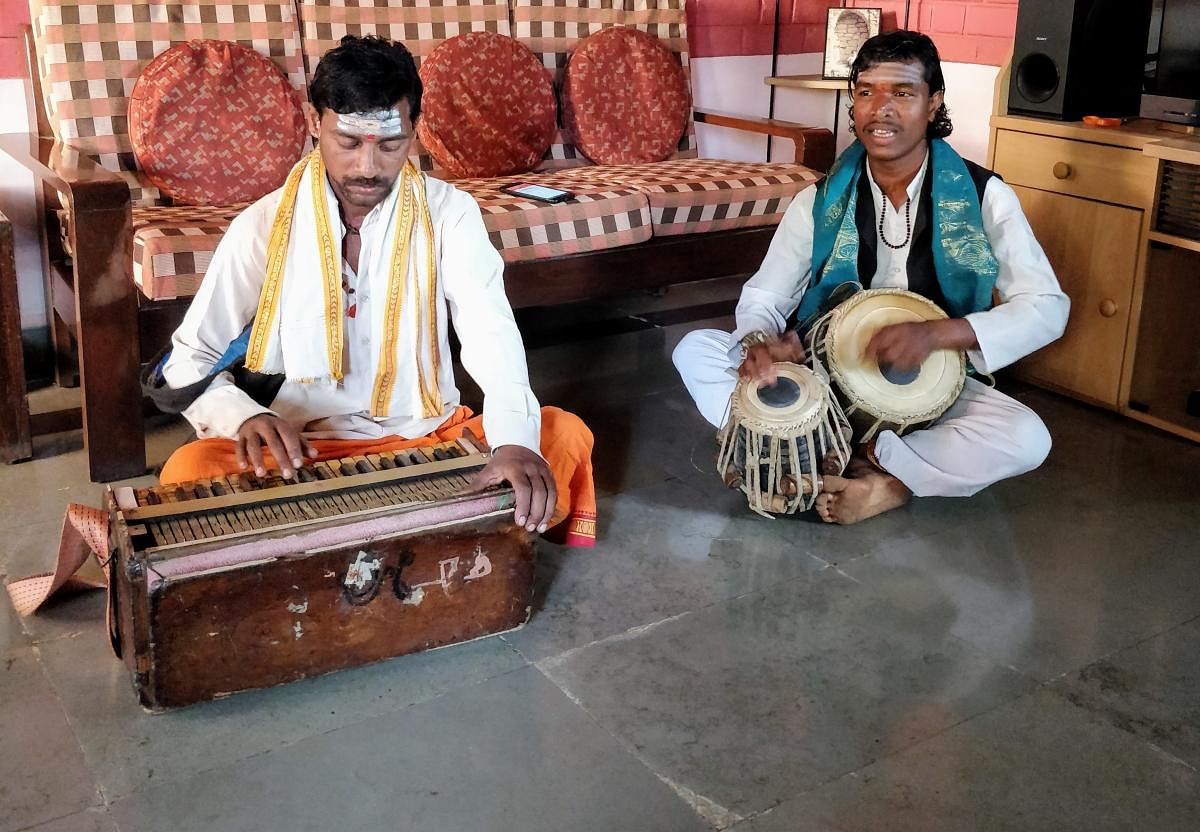 Folk Tradition Bhuvanesh Yedabale and his brother Hanumant on a performance.